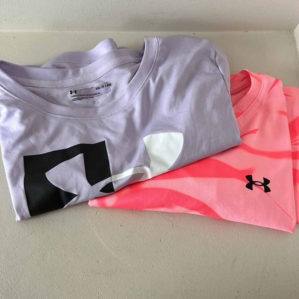2 women’s under armour shirts